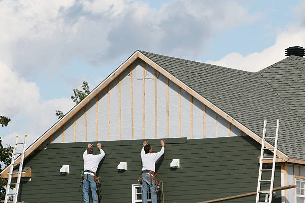 Professional Storm Damage Siding Repair technician working in Sandusky, OH